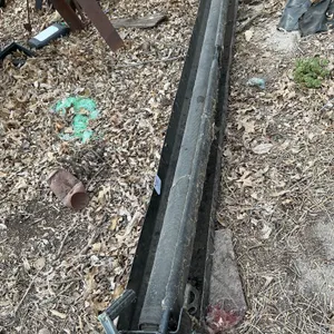 Trailer roll up net carrier