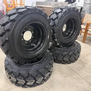 (1) Unused 14 Ply 12-16.5 Skid Steer Tire on Steel Rim