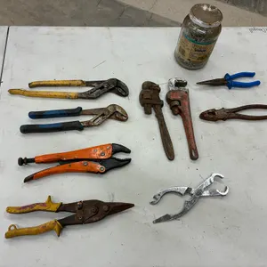 Box of Wrenches, Pliers and a Jar of Screws