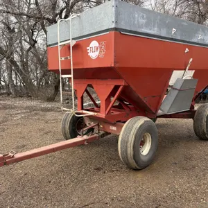 EZ Flow Model 450 Gravity Box on EZ Trail 1580 Gear, Surge Brakes, 16.5L-16.1 Tires, Stored Inside