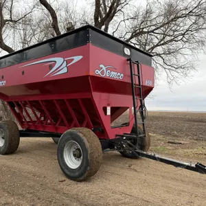 Demco 650 Gravity Box, 445/65R22.5 Tires, Extendable Hitch, Brakes, Lights, Side And Center Discharg