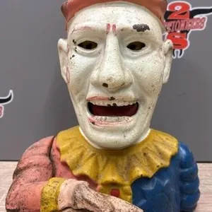 Vintage Humpty Dumpty Cast Iron Coin Bank.