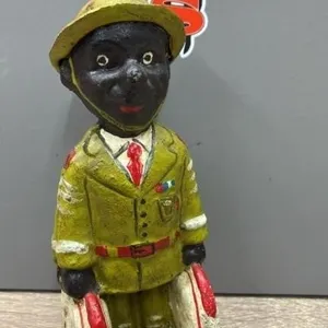 Black Americana Cast Iron Soldier Coin Bank.