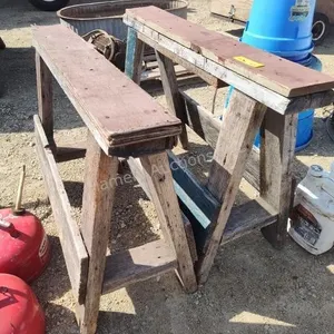 2 sawhorses and trash can