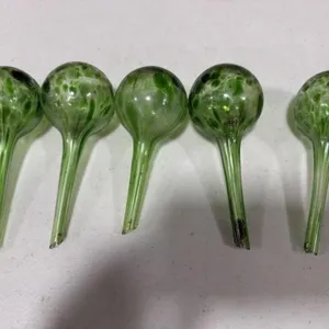 decorative hand-blown glass plant watering globes