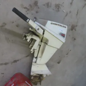 Chrysler 9.9 HP Outboard Motor with Gas Can