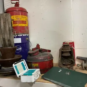 ANTIQUE& VINTAGE ITEMS - SAFETY CAN, FIRST AID KIT, GULF OIL 5 GAL PAIL, CARRIAGE SIDE LIGHTS, PROPANE TORCH, METAL JERRY CANS, WOOD PULLEY, VERY 