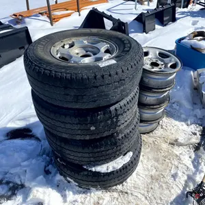 (4) Firestone TransForce AT2 Tires on GM Stock Rims & GM Stock Rims
 UNRESERVED