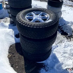 (4) Cadillac Rims w/ Tires
 UNRESERVED