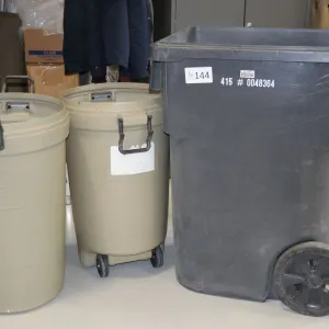 3 shop garbage bins including two barrel/drum bins and one large wheeled bin