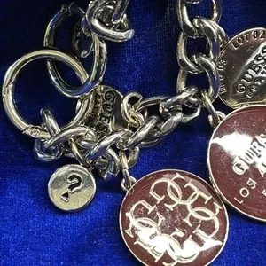 Huge guess charm bracelet 8.5 inches