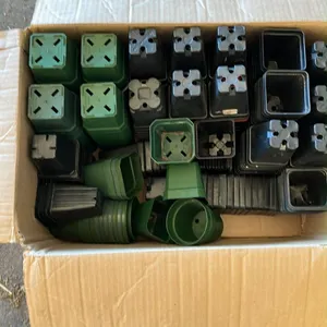 OFFSITE - Box of plastic nursery flower pots, sizes 2.5”, 3”, and 3.5”.