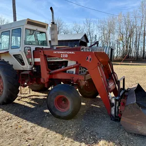 IHC 966 2wd Tractor w/ IHC 2350 FE Loader, 7’ Bucket & Bale Forks, Dual Hydraulics, Dual 540 & 1000 Pto, Meter reads 179hrs, (Total hrs 10493), Origin