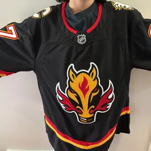 Calgary Flames Jersey - Donated by That Car Guy Inc.