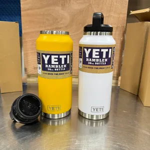 (2) YETI RAMBLER 36 OZ INSULATED BOTTLES - YELLOW & WHITE