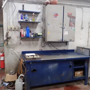 Lot of Rousseau 6'x30" Shop Bench and  2-Door Cabinet. NOTE: DAMAGE TO BENCH.