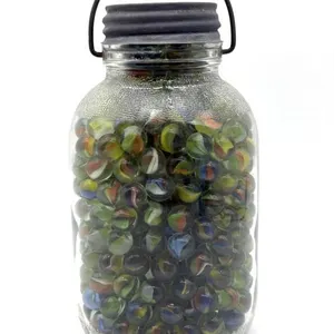Marbles in Lidded and Handled Glass Jar