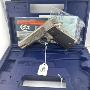 Colt Combat Commander 45 cal
Case and one clip