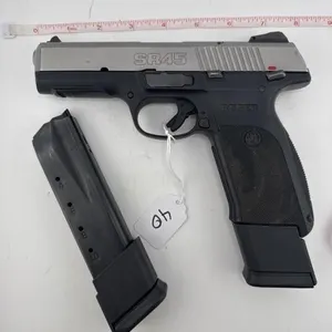Ruger SR45 45 cal
Two extended grip clips