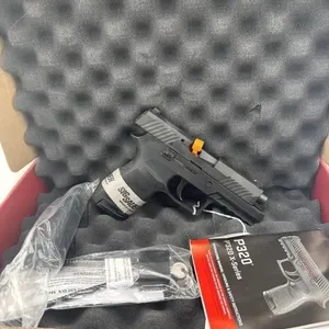 SIG P320 Compact 40 cal 
Box and two 13 round