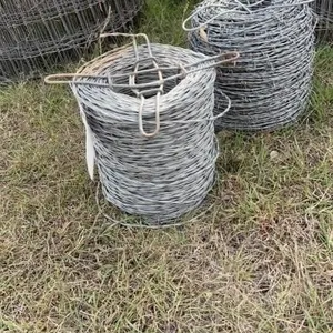 1 roll of slick wire and 1 roll of barbed wire. 2