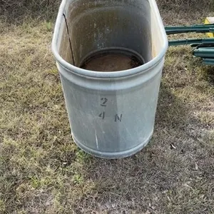 Galvanized water trough.