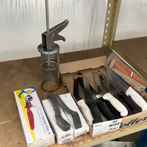 Knives, Forks, Sauce Dispenser and Scoop