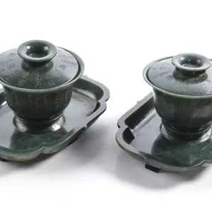 PAIR OF CHINESE INCISED SPINACH JADE GAIWANS