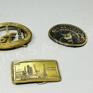 3 brass belt buckles