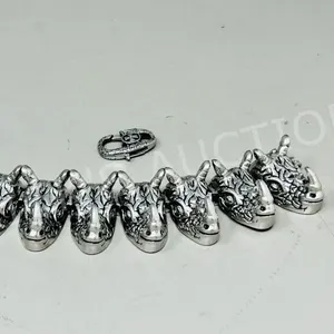 polished metal rhinoceros bracelet - 7" long