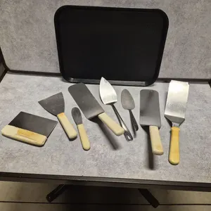 (3) Assorted Hamburger Turners, (3) Assorted Icing Spatulas, (1) Dough Scraper