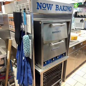 “Now Baking” stainless steel surround for pizza oven, 34.5” wide x 66” tall
