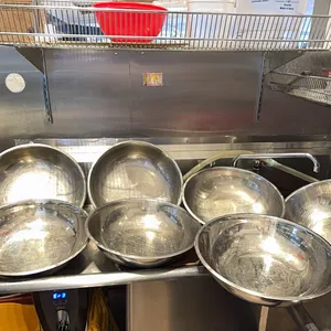 7 stainless steel bowls, 14” wide