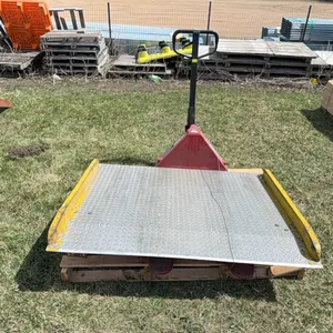 (1) Pallet Jack and (1) Aluminum Dock Plate 60” x 48” (Forklift Useable)