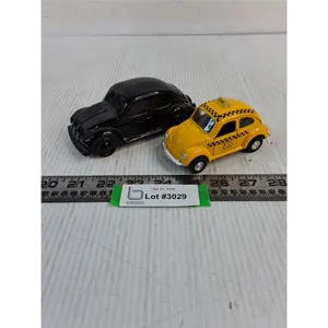 Volkswagen Memorabilia (Vintage Empty Avon Bottle & Diecast Beetle Taxi)
