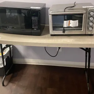 WHITE 2 DOOR FRIDGE, BLACK DANBY MICROWAVE, STAINLESS STEEL KITCHENAID TOASTER OVEN,