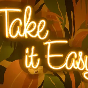 "TAKE IT EASY" LIGHTED SIGN - APPROX. 2 1/2FT ACROSS X 1 1/2FT WIDE
