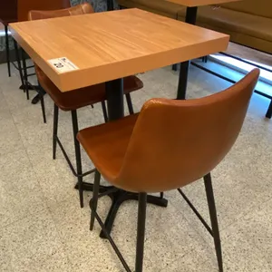 SMALL COUNTER HEIGHT BAR/BISTRO TABLE WITH 2 BROWN LEATHER UPHOLSTERED CHAIRS -