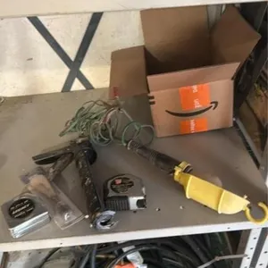 Caulking gun, light, tape measures