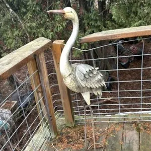 Metal bird yard art