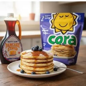 Nutty Club Pancake Syrup Bottle and Cora Pancake Mix