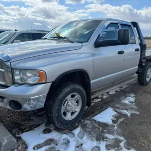 2005 DODGE RAM 2500 P/U, 5.9L CUMMINS DIESEL, 6-SPEED MANUAL TRANSMISSION, SB CLUTCH, FLAT DECK, 411,334 KM SHOWING, S/N 3D7KS28CX5G856332 **NEW TIRE,