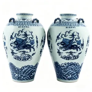 A PAIR OF BLUE AND WHITE 'QILIN' MOCK-HANDLE VASES