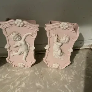 Two Pink Wall Vases