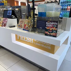 Entire 20ft x 10ft Kiosk Shell with Corian Walls, Corian Countertops, Tempered Glass, and Stainless Steel Front Cabinetry. Buyer to remove April 27-29