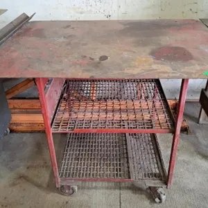 Red metal rolling work table