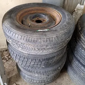 4 tires on rims p205/70r15  Goodyear,quadra
