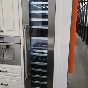 Thermador T18IW905SP built-in wine refrigerator. Features a glass door with stainless steel finish, digital temperature controls, LED interior lightin