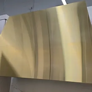 GE UVC9420SL1SS range hood insert enclosed in a 48" brass-finish hood. Features stainless steel insert, baffle filters, push-button controls, and LED 