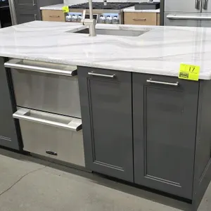 Kraftmaid 88" x 51" kitchen island. Features painted wood cabinets and solid surface top. Includes Signature Kitchen Suite SKSDW2411S 24" stainless st